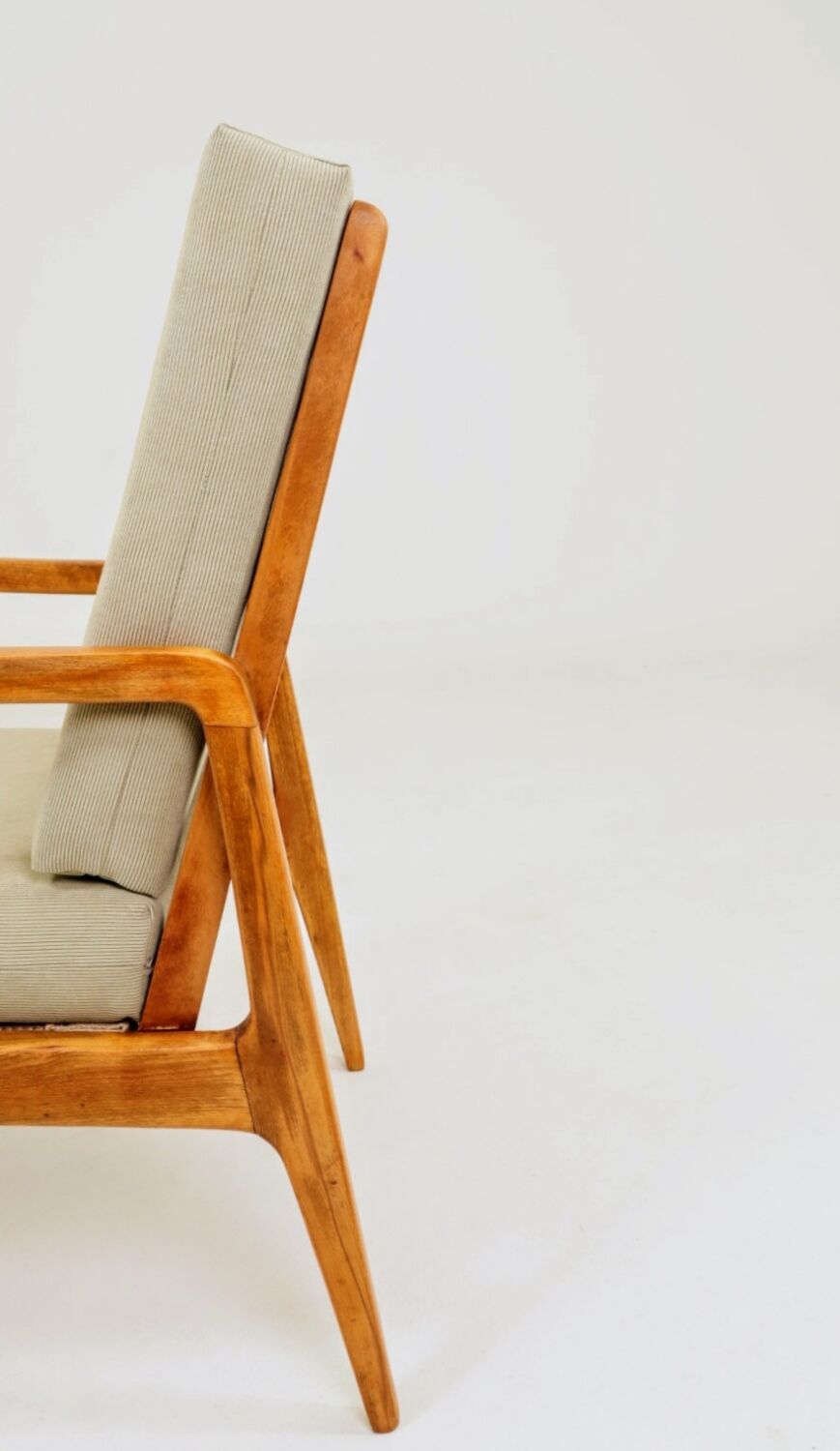 Vintage armchair in khaki corduroy, mid-century modern design from the 1960s.
