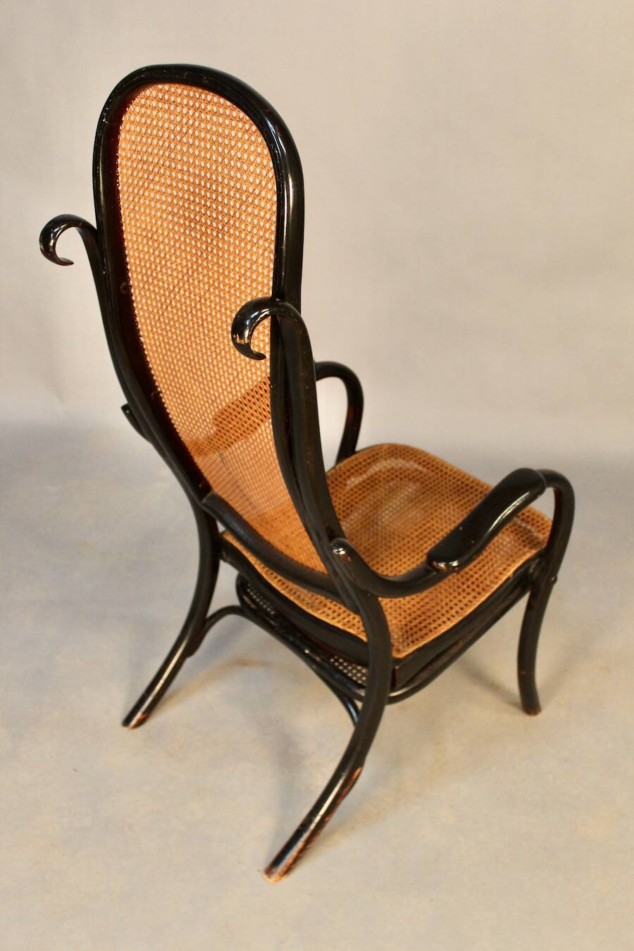 Bentwood cane armchair with mechanism and footrest