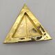 Cecile & jeanne: triangular gold-plated metal pocket tray with hieroglyph decoration.
