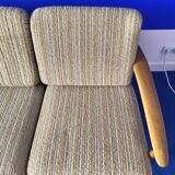 Scandinavian sofa in wood and vintage fabric from the 60s