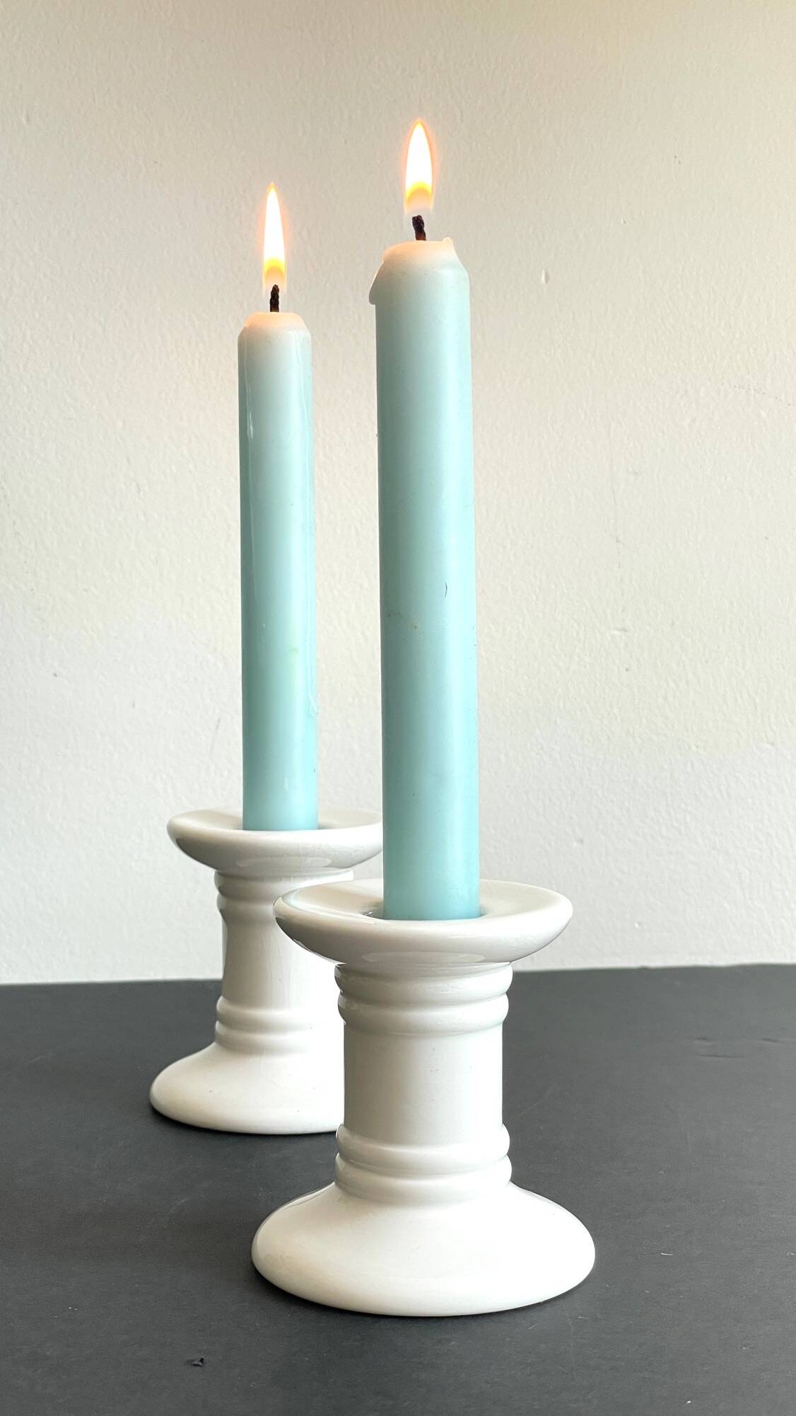 Pair of White Ceramic Candlesticks