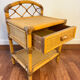 Pair of 1960s rattan bedside tables from France