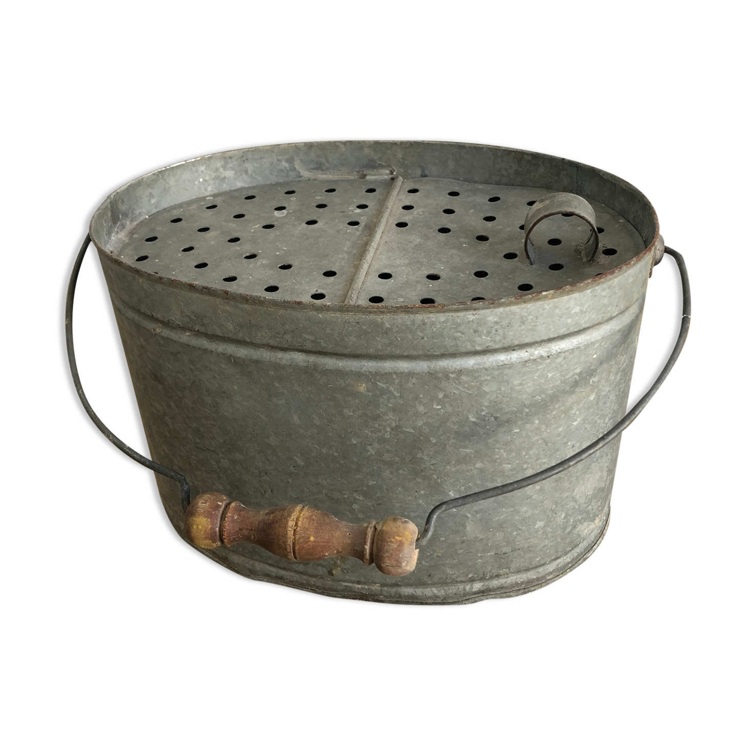 Old zinc stud, fisherman's live bucket