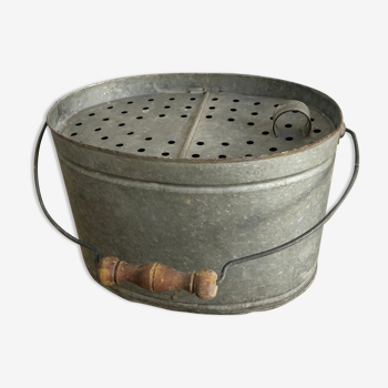 Old zinc stud, fisherman's live bucket