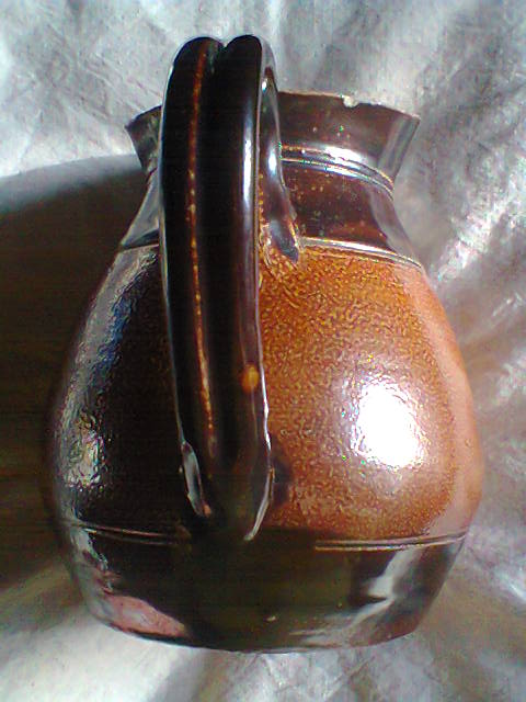 JEB stoneware jug