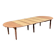 Round extendable banquet table stripped in solid mahogany with 4 extensions, 19th century.