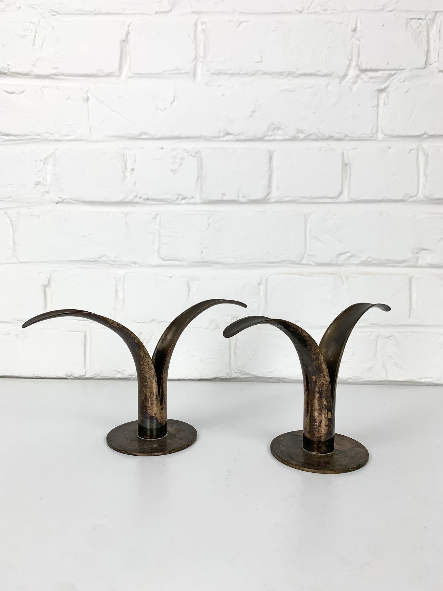 Pair of Lily brass candle holders, Ystad Metall, Sweden, design Ivar Ålenius Björk