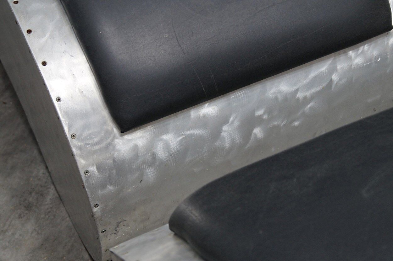 Industrial aluminum & vinyl lounge chair with footrest, 1970s