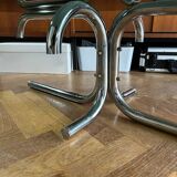 70s design oval coffee table in smoked black glass with chrome legs.