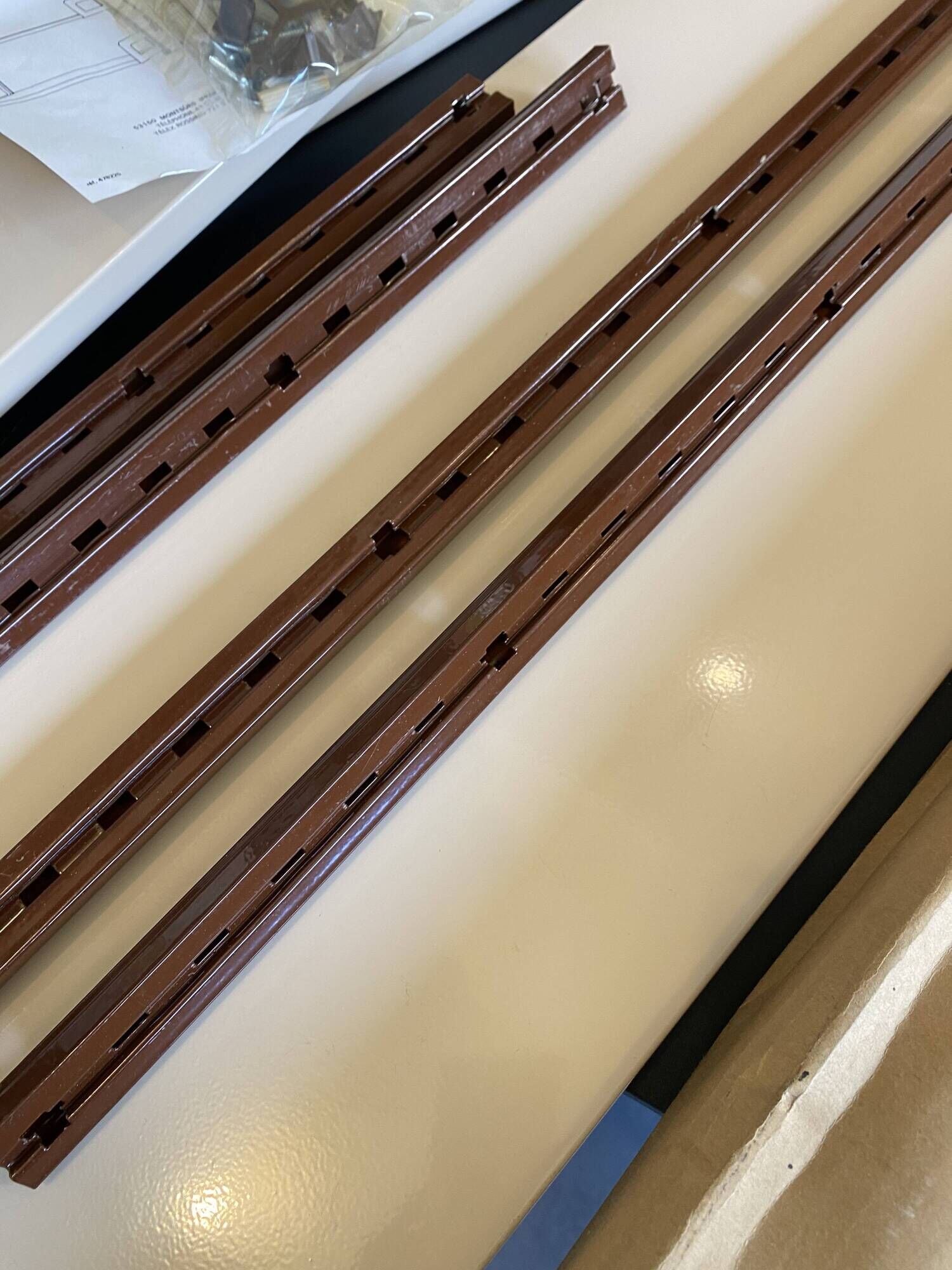 Modular metal wall shelf in brown and beige vintage 70s design.