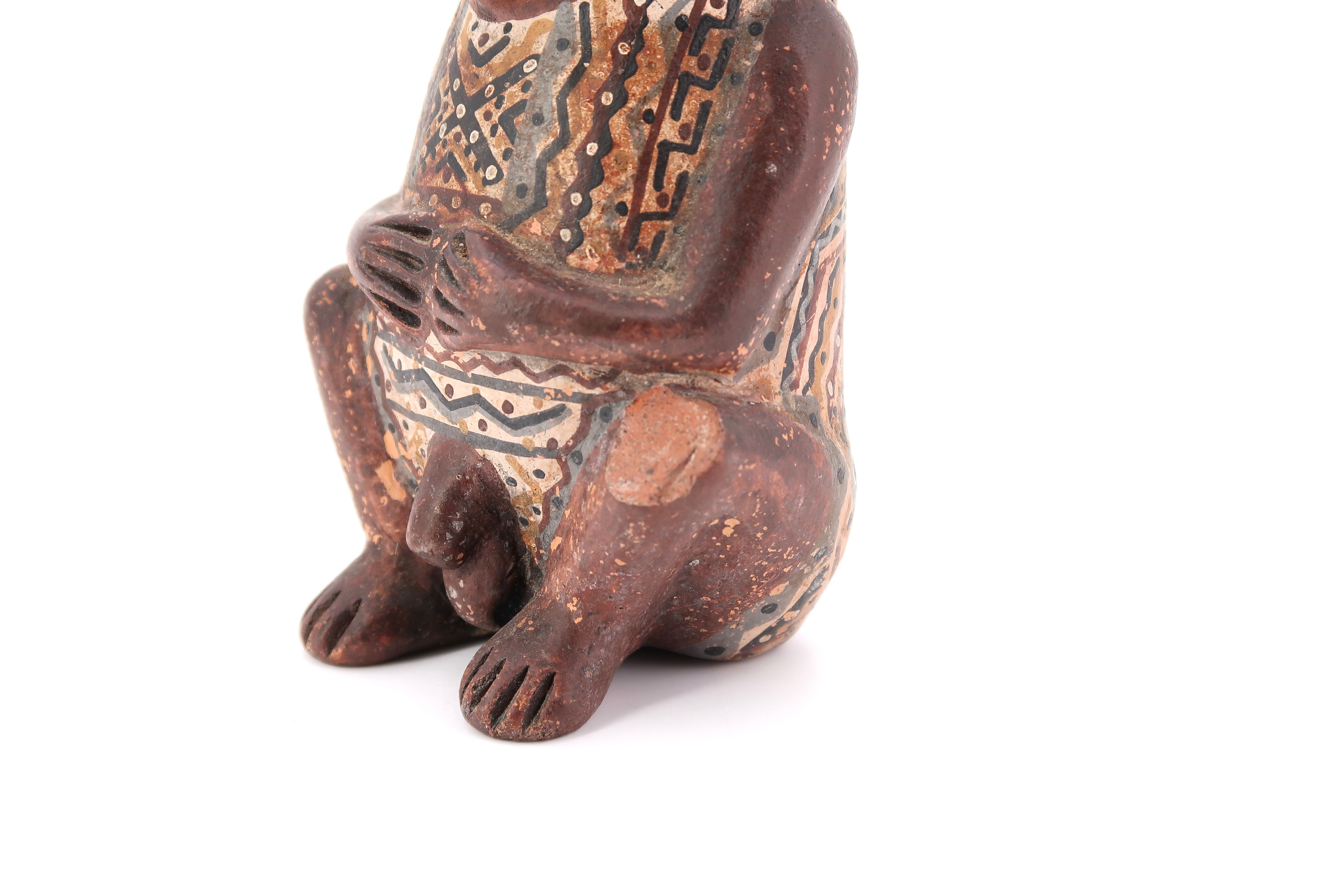 Anthropomorphic Peruvian terracotta vase