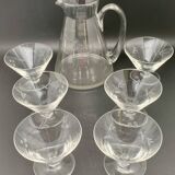 Glass and carafe set with chiseled flower motif