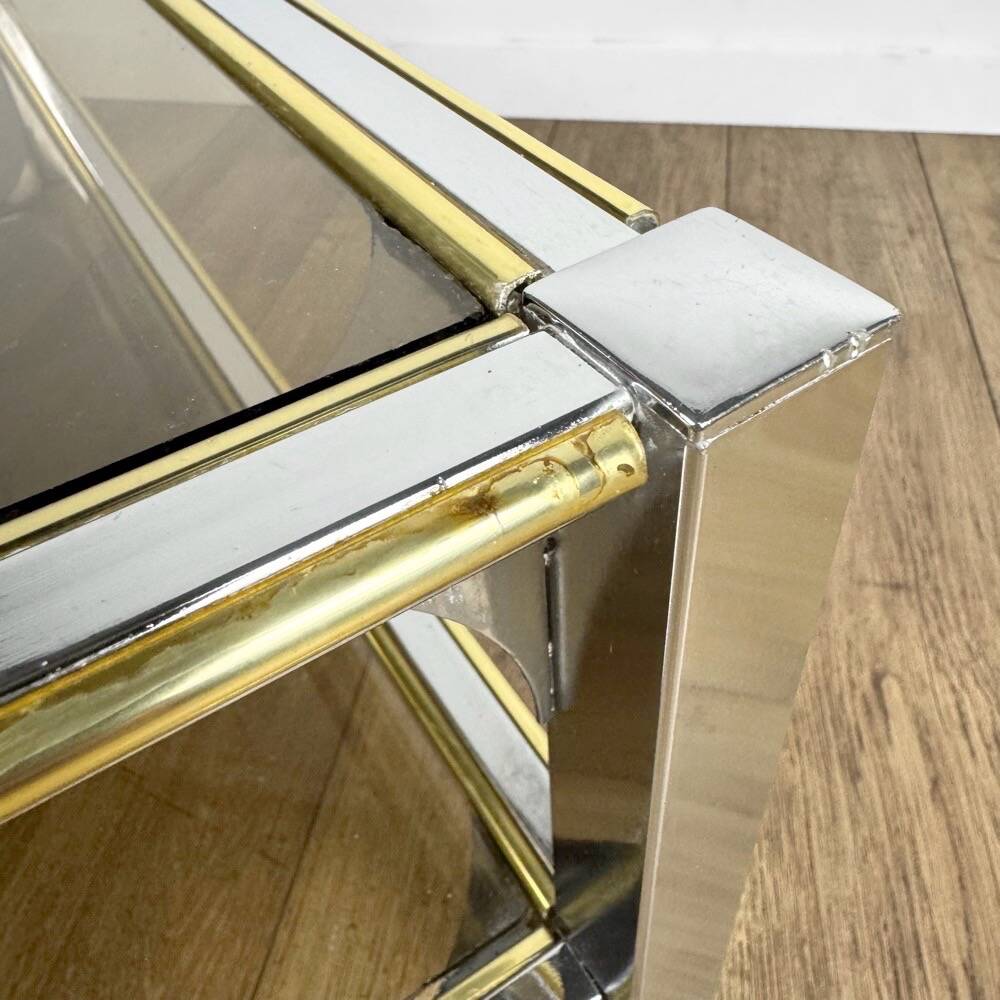 Chrome and smoked glass coffee table with double top from the 1970s.