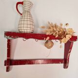 Wall shelf in garnet red wood