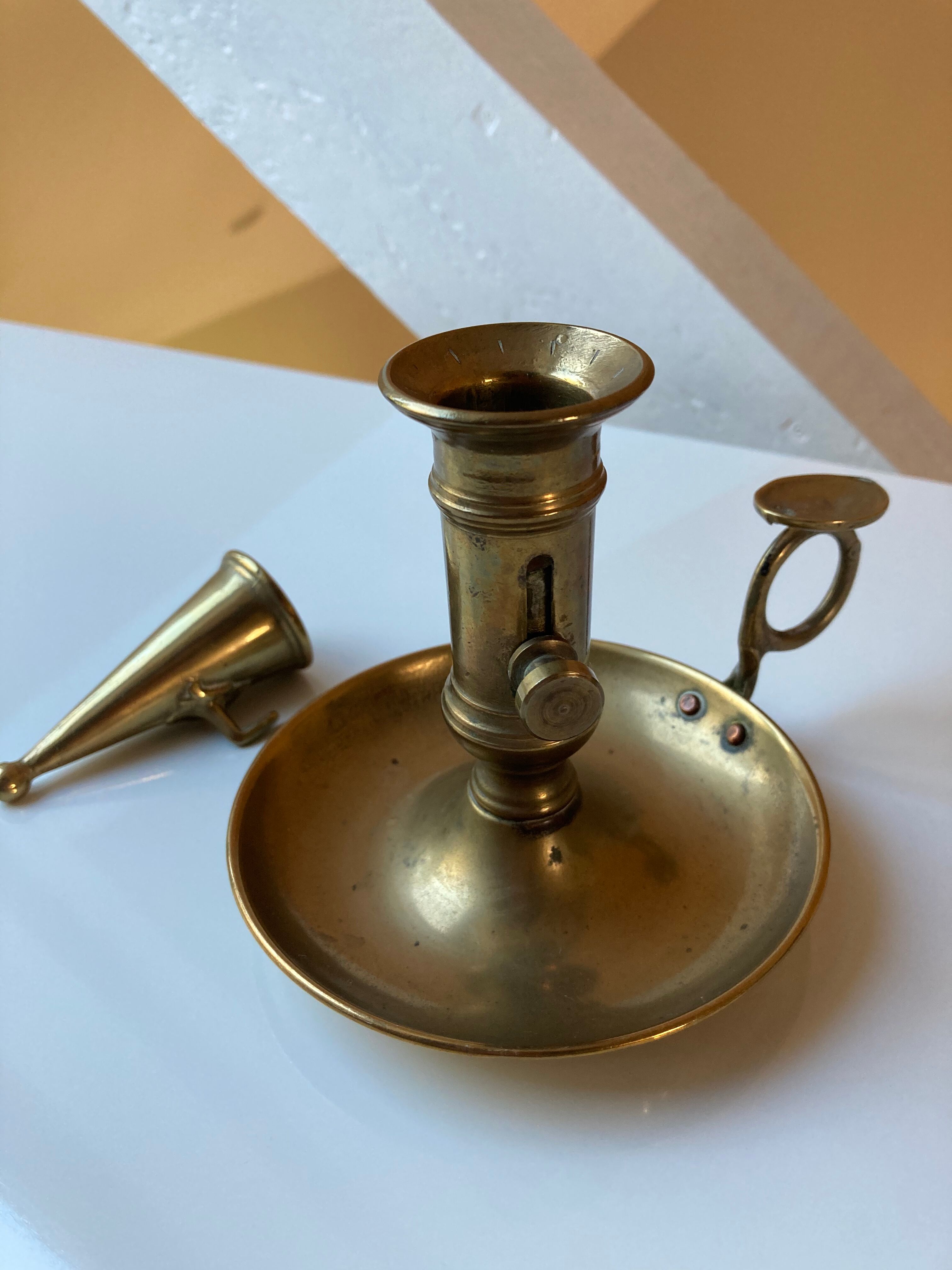 Brass hand candle holder