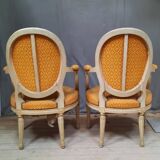 Pair of Louis XVI style medallion armchairs