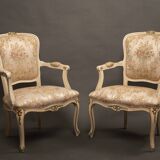 Pair of Louis XV style armchairs – Carved, gilded wood and brocade fabric