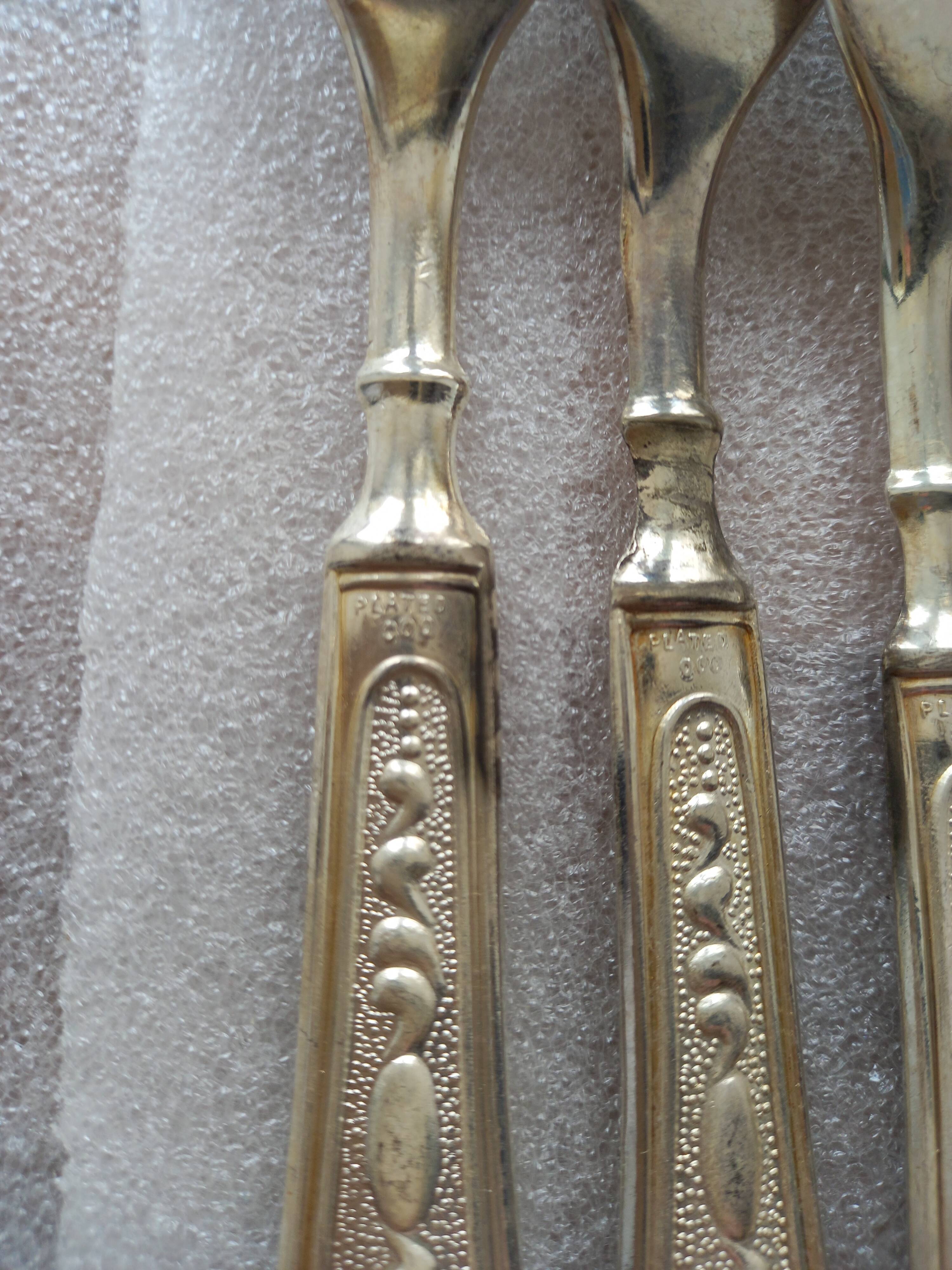 Vintage cutlery set with classic decorative pattern
