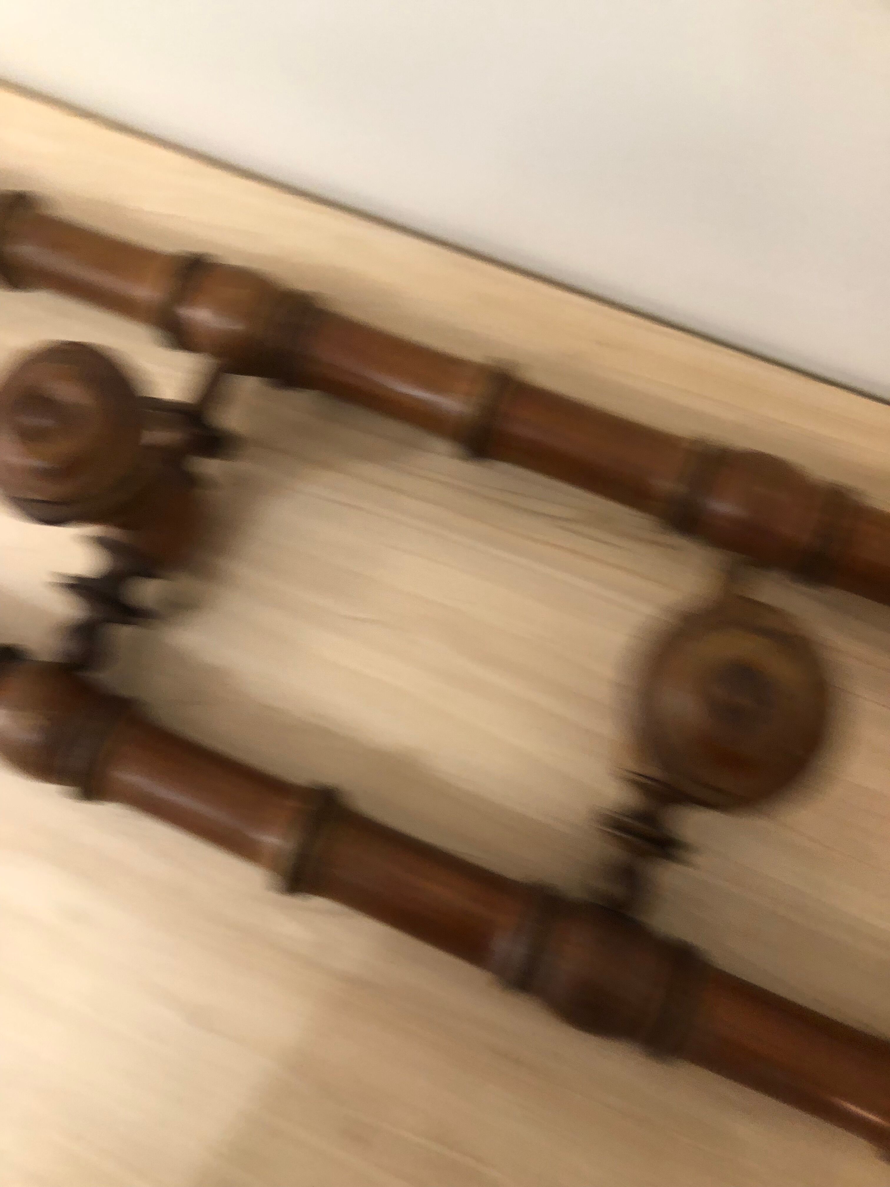 Wooden coat rack with swivel hooks