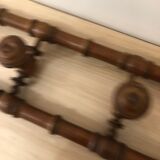 Wooden coat rack with swivel hooks