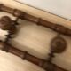 Wooden coat rack with swivel hooks