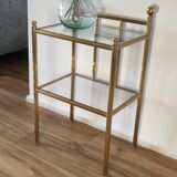 Bedside table in brass and glass.