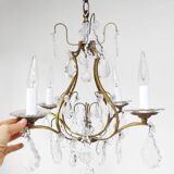 Old French chandelier in gilded brass with tassels