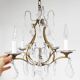 Old French chandelier in gilded brass with tassels