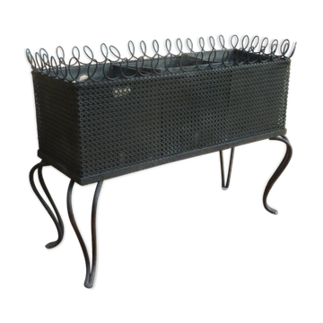 Perforated black metal planter from the 1950s.