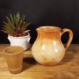 The stoneware pitcher