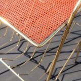 Perforated sheet metal magazine rack in the style of Mathieu Mategot, 1950s