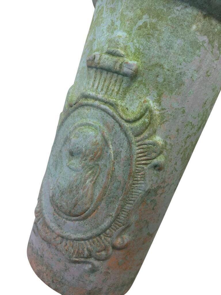 Vintage stone pot / vase with medallion