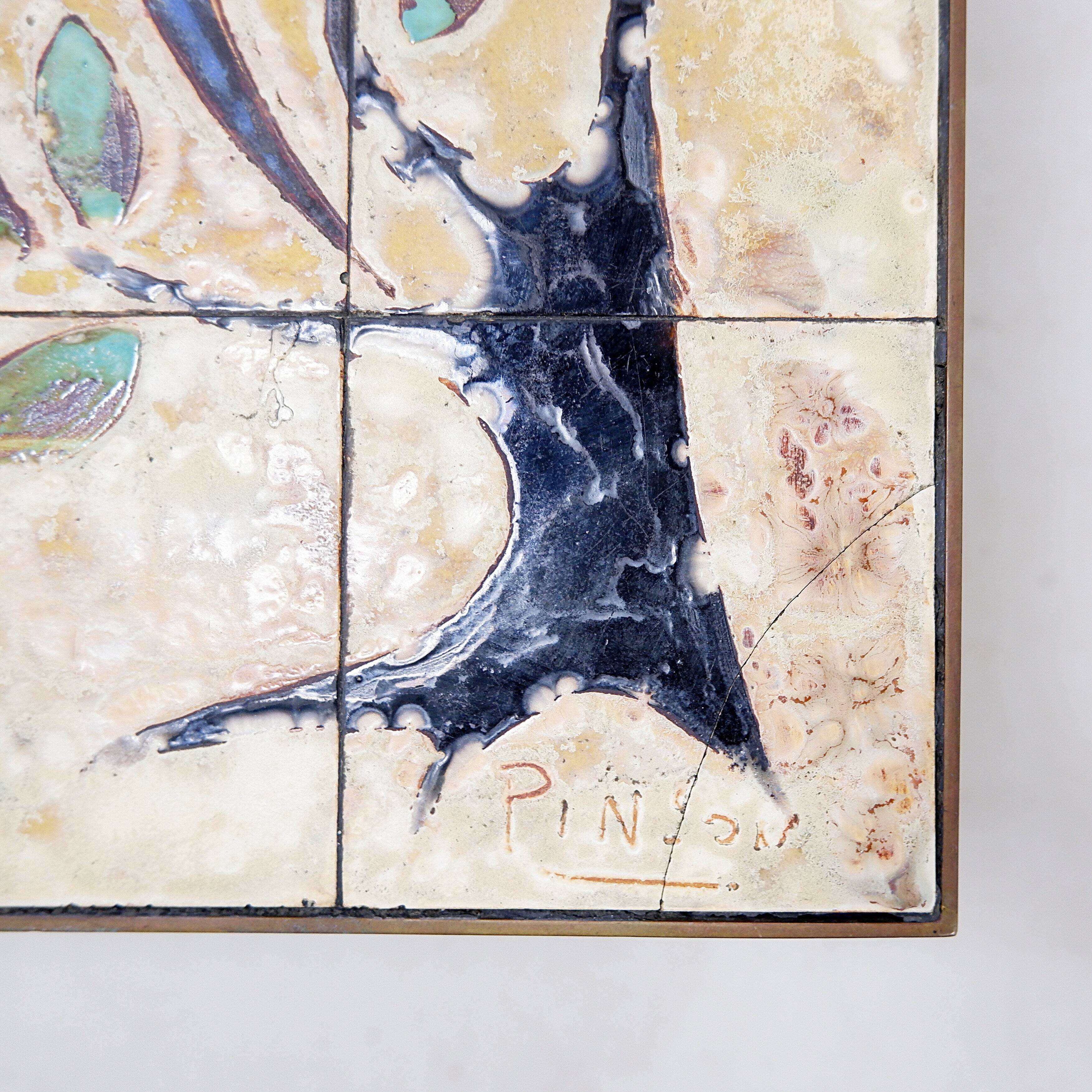 Coffee table with ceramics by Charles Emile Pinson, circa 1958.