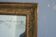 Mirror restoration in Golden stucco