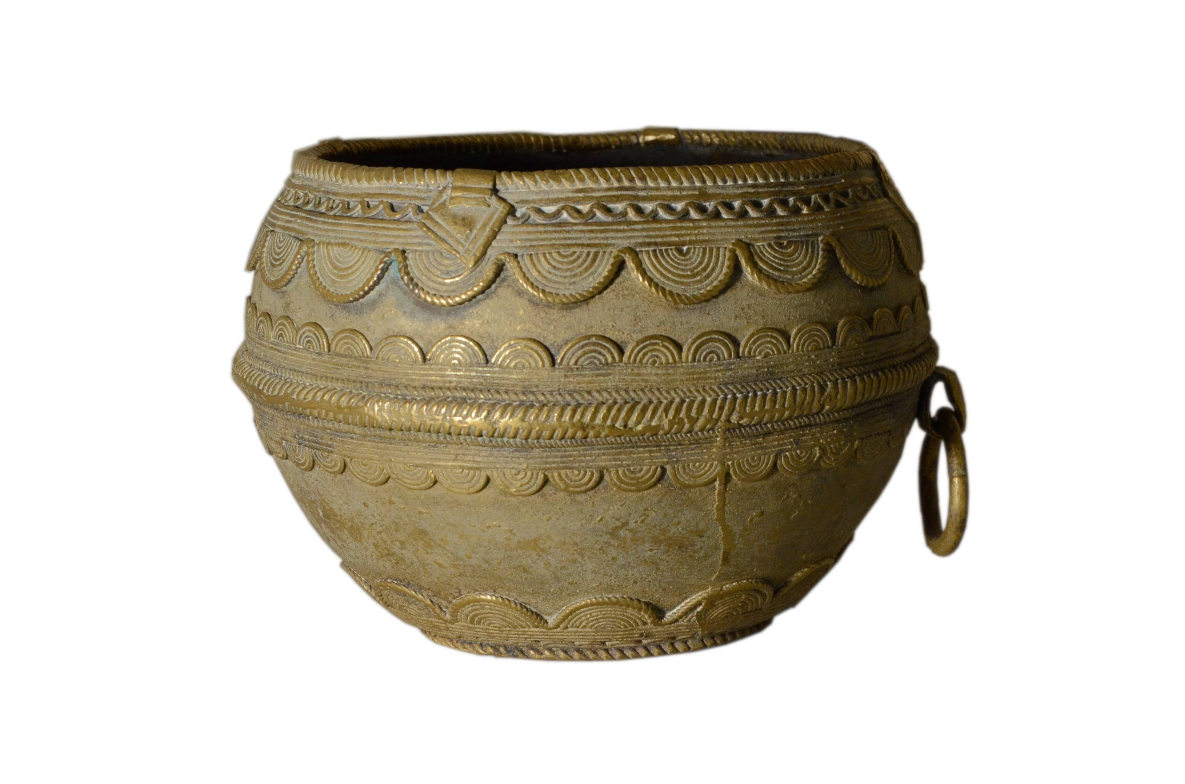 Ancient bronze ethnic pot, handcrafted in India.