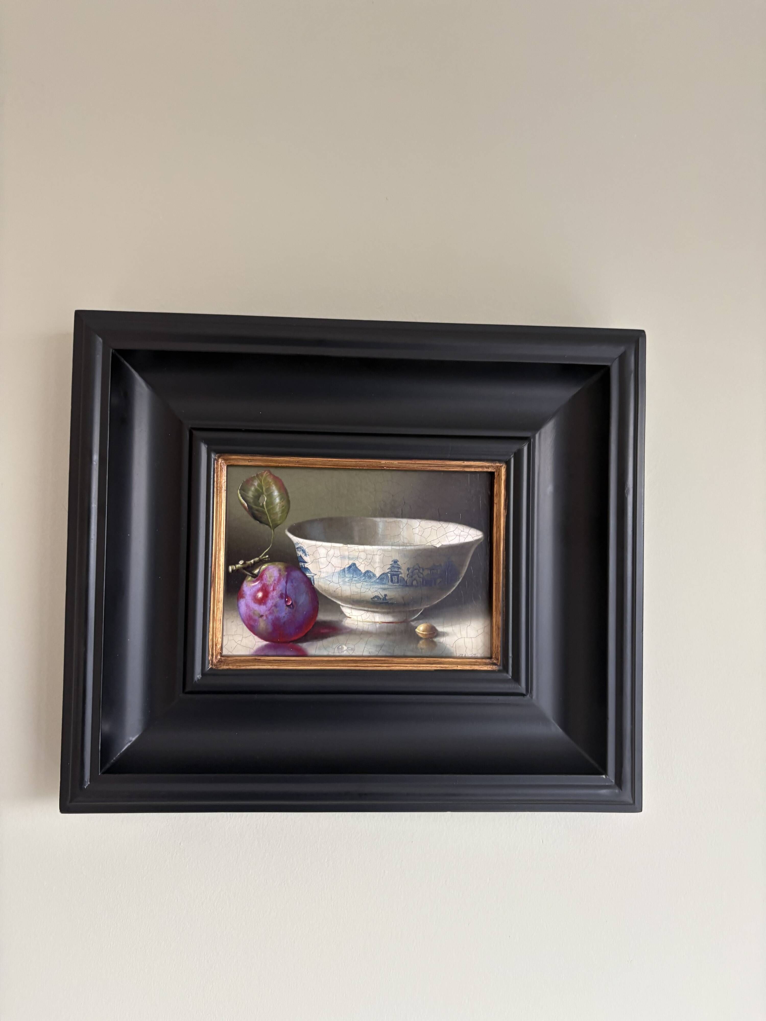 Beautiful still life with plum and bowl.
