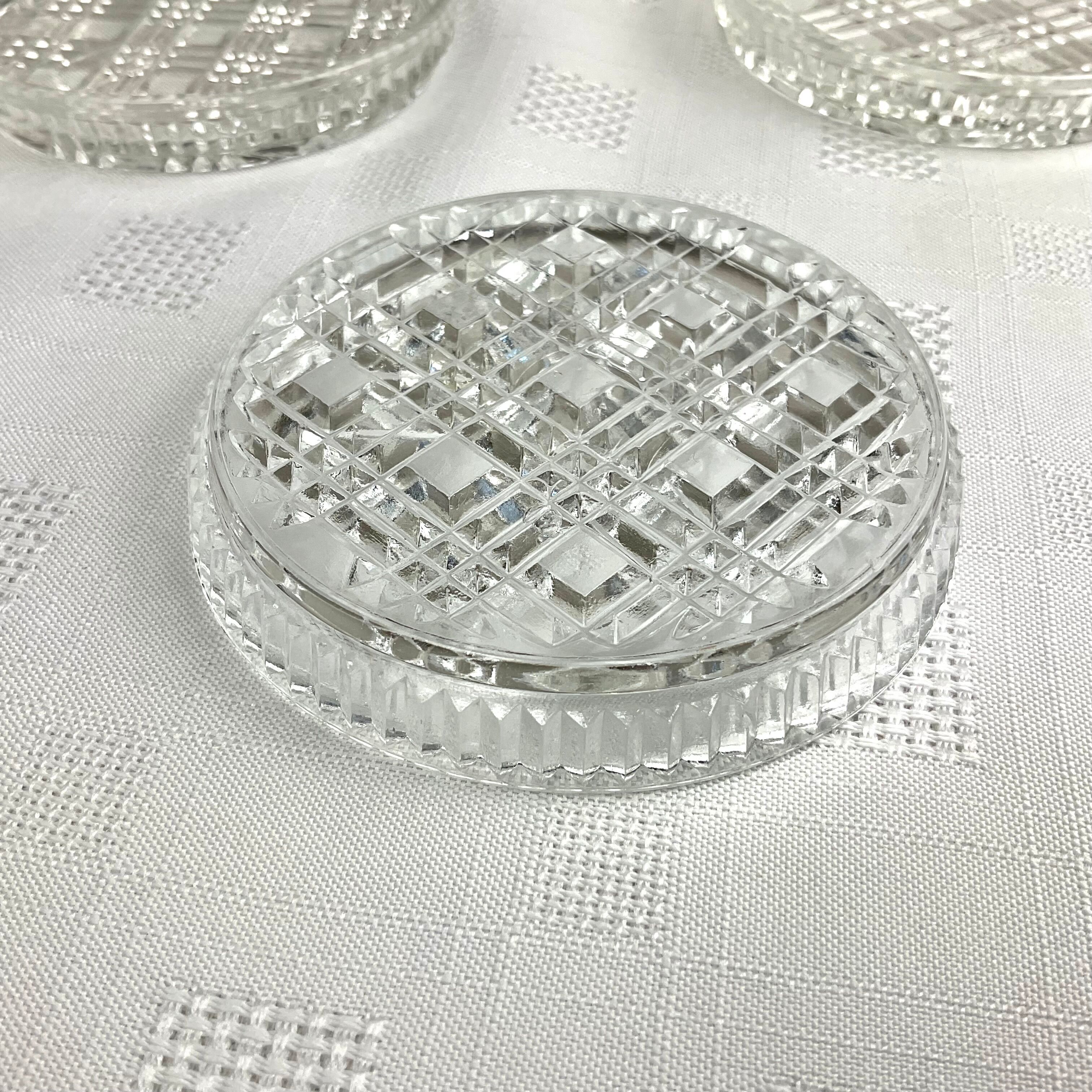 Series of 4 vintage glass coasters