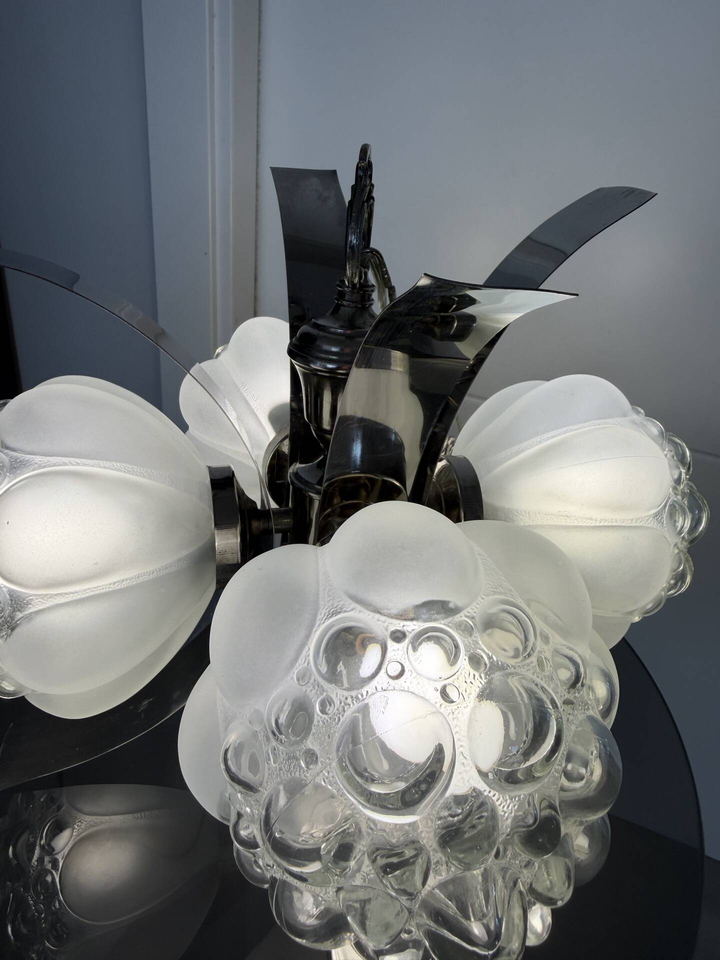 Vintage chandelier with 4 glass bubble globes and silvered metal.