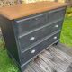 Vintage black patina chest of drawers
