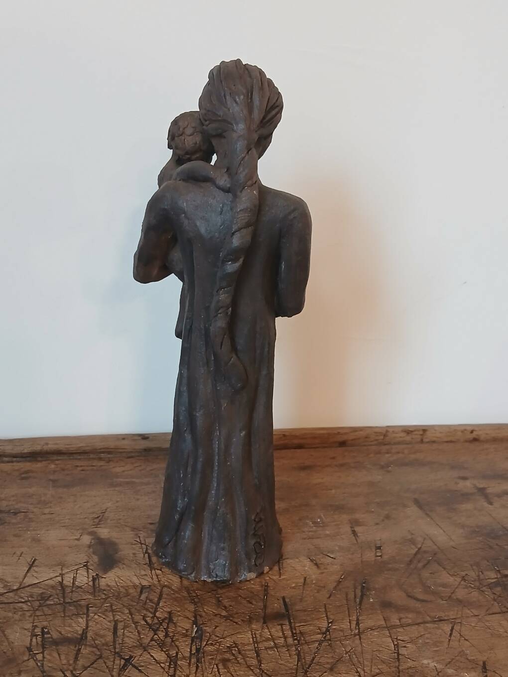 Sculpture representing a woman holding a child - original terracotta