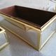 Golden metal table gardeners and Ousta design mirrors made in Holland