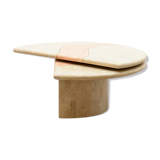Travertine coffee table with swiveling top.