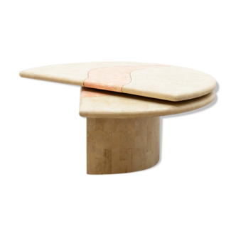 Travertine coffee table with swiveling top.