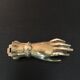 Hand brass paperweight