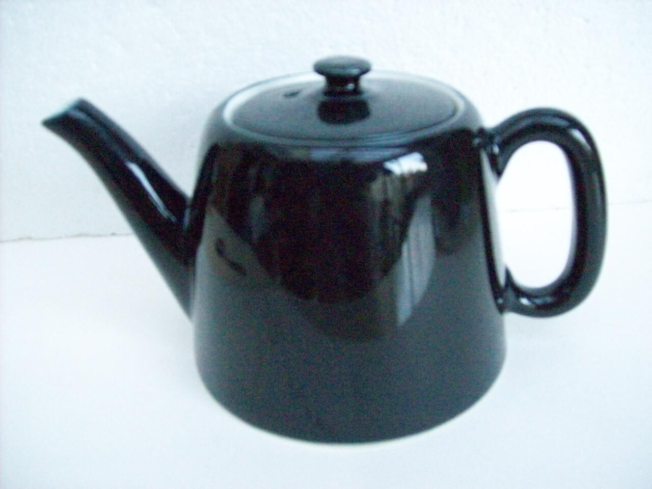 Vintage black ceramic teapot