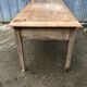 Antique solid cherry farm table with 3 front drawers.