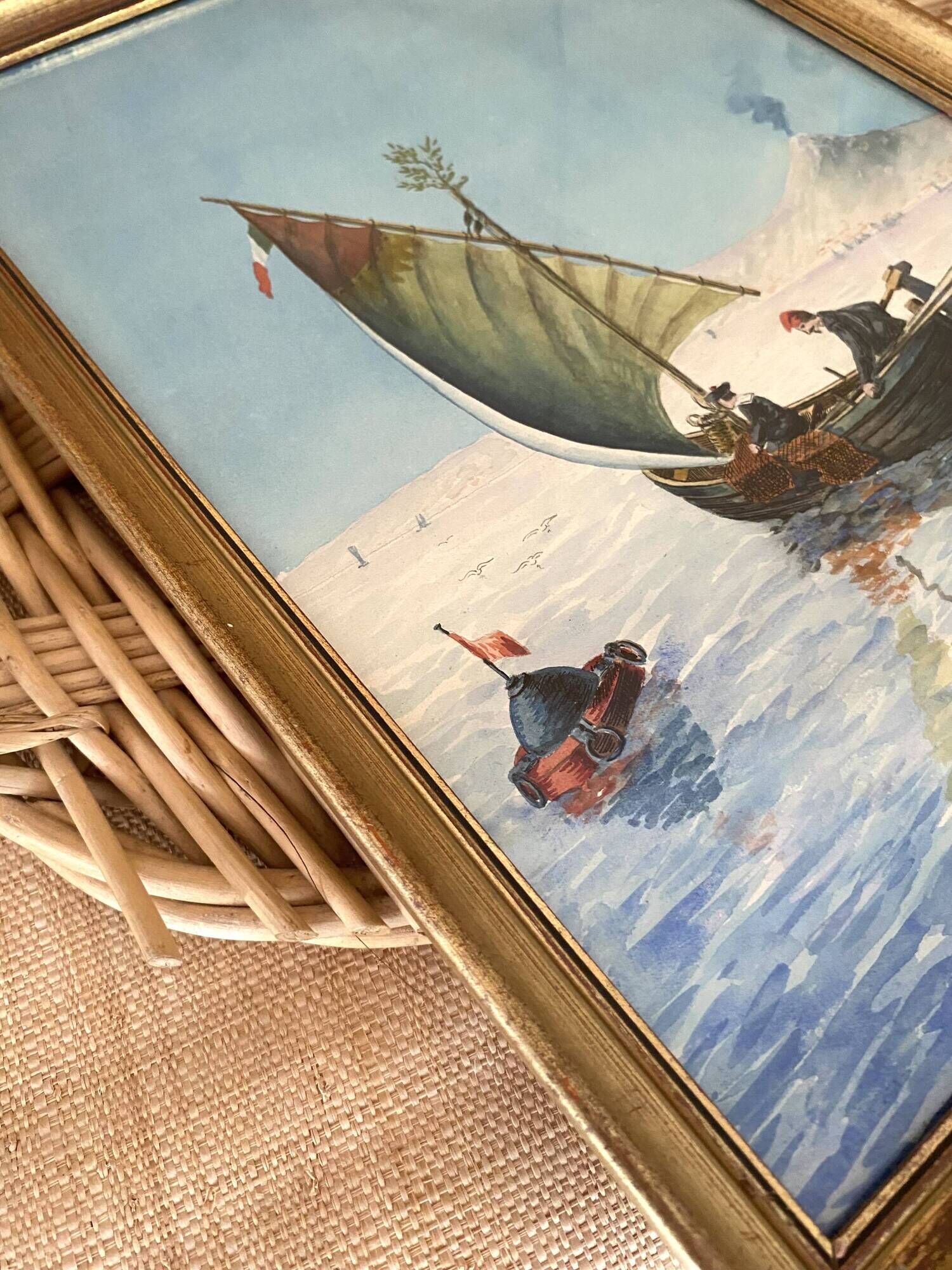 Painting "Sicilian Fishermen" framed under glass.