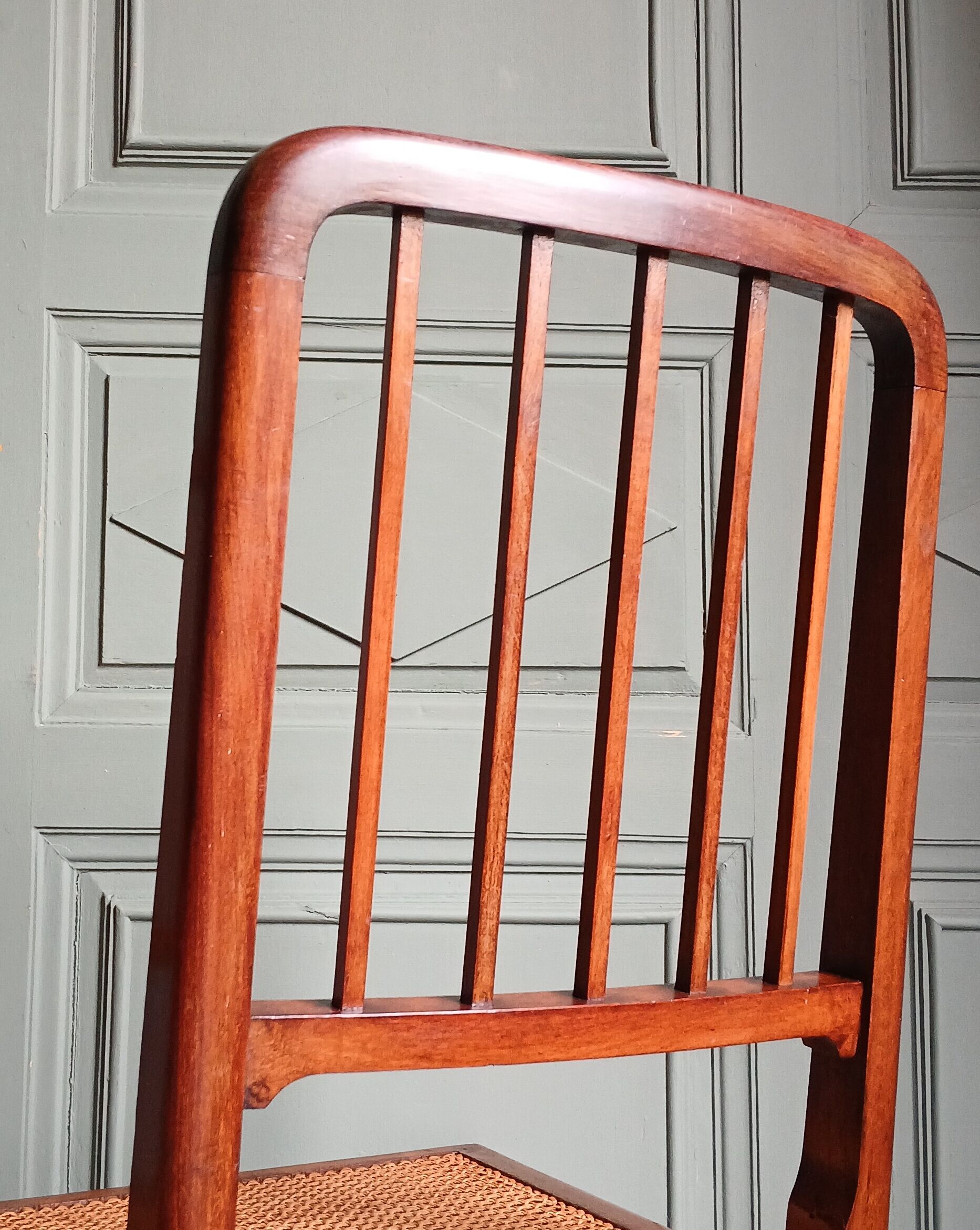 Pair of caned mahogany chairs, circa 1930.