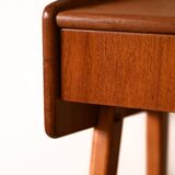 Bedside table with rattan magazine rack