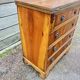 Small English chest of drawers with a folding top.